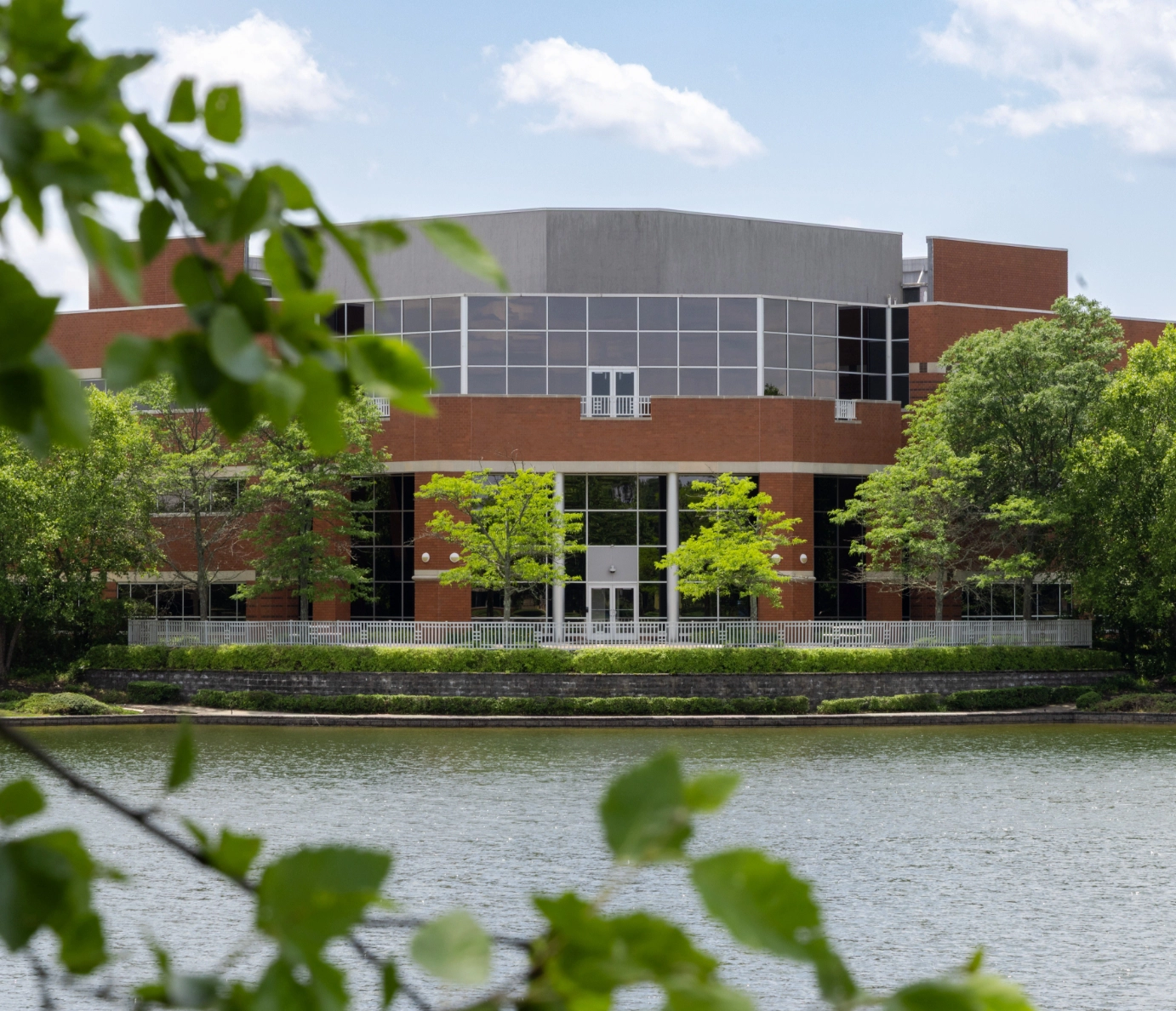 Waterside brick office building in the Cedar Brook corporate center